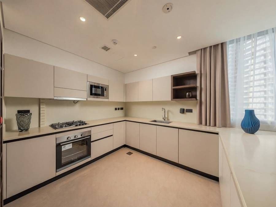 Bedroom of the furnished Unit 1003 mock-up apartment